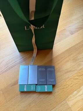 La Mer Green and Teal Mini Boxes with La Prairie Silver Packaging